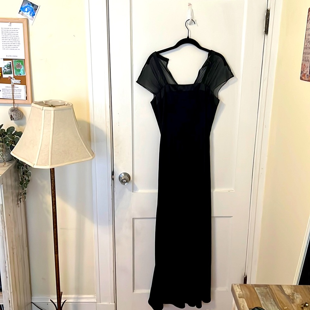 Long black dress with sheer sleeves. Perfect for choir and orchestra shows
